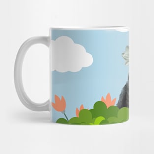 Tabby cat in flower bushes on brighten day Mug